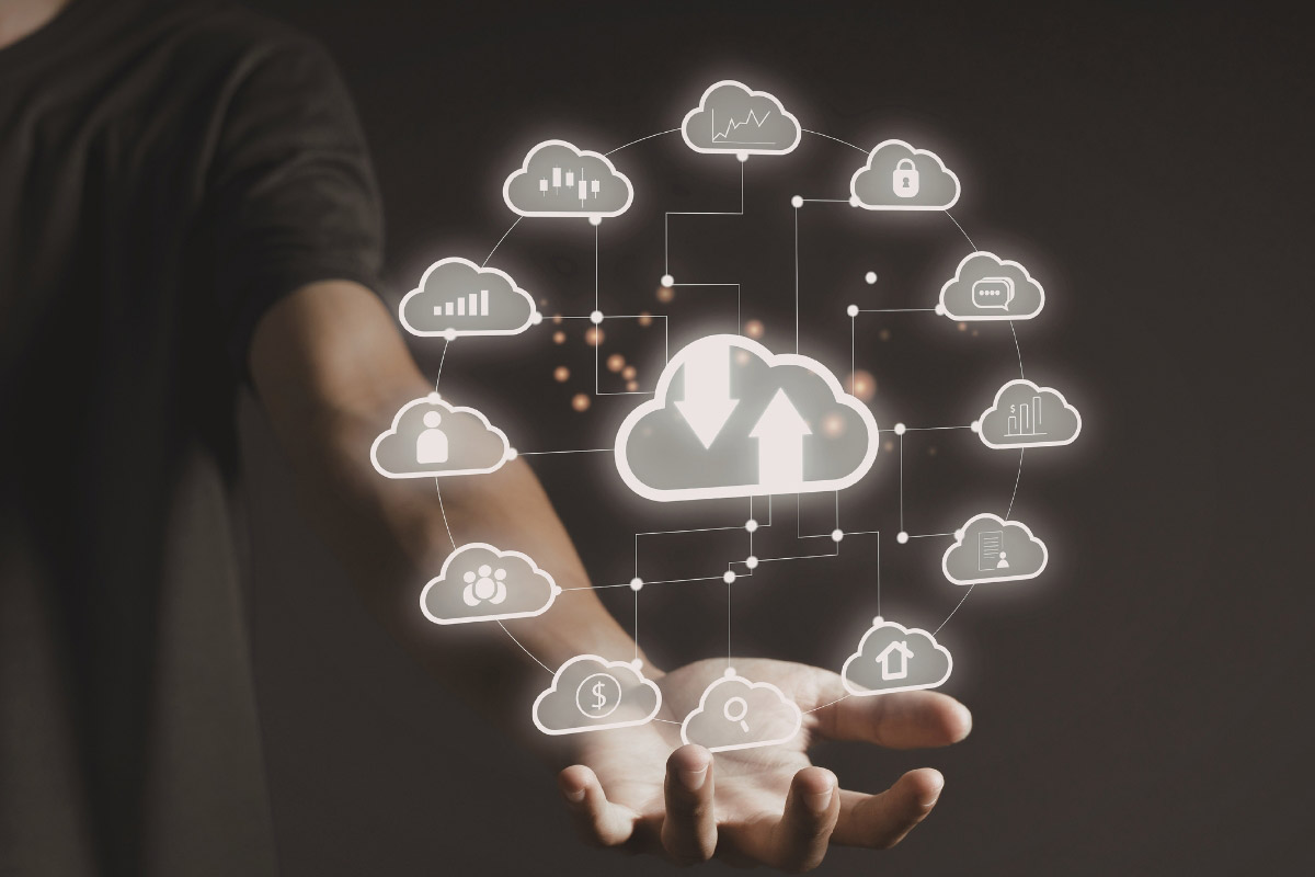 Cloud network icons above hand representing secure storage and encrypted data movement across locations.